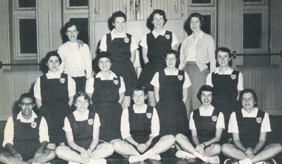 A black and white photo from the 1956 women's basketball team.
